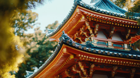 Traditional Japanese pagoda with curved roofs and ornate details.の素材