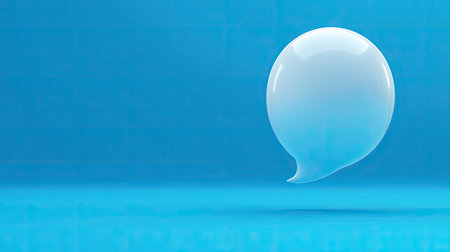 Stylish 3D white chat bubble on a solid blue background, perfect for enhancing communication themes, messaging apps, or social media graphics.の素材