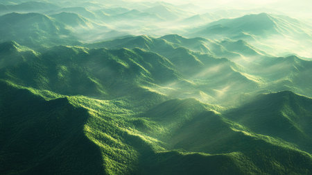 An aerial view of the Smoky Mountains in spring, showcasing layers of verdant hills and a soft morning haze.の素材