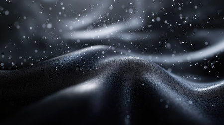 A stunning close-up of elegant black fabric, softly illuminated with sparkling particles. The abstract composition evokes depth and beauty, perfect for artistic projects.の素材