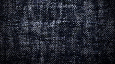 A close-up view of a dark textured fabric background, ideal for design projects. This versatile material offers a rich, monochromatic aesthetic perfect for various creative applications.の素材
