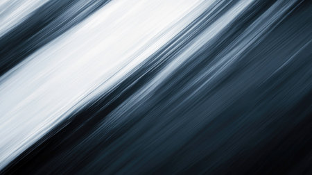 An abstract motion blur image featuring a gradient of black and white tones, ideal for backgrounds, design projects, or artistic presentations.の素材