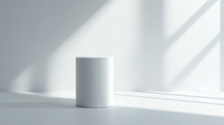 Elegant minimal product stand with a cylindrical shape in a white studio setting. Ideal for showcasing products or creating a clean, modern presentation. 3D render.の素材