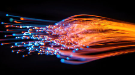 This vibrant image showcases glowing fiber optic threads in motion, illustrating cutting-edge technology and dynamic energy. Perfect for digital and abstract design needs.の素材