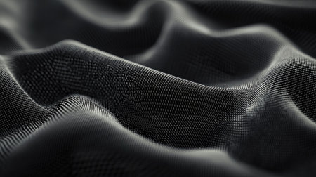 A captivating close-up of soft black fabric showcasing elegant waves and intricate texture details, perfect for backgrounds or fashion-related designs.の素材