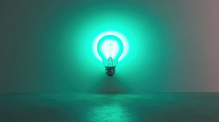 A vibrant neon green light bulb radiates illumination against a minimalist background. Perfect for themes of creativity, innovation, and energy.の素材