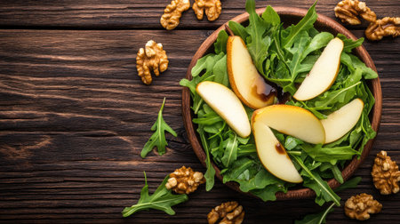 This fresh and simple arugula salad features crisp apple slices and walnuts, beautifully arranged in a wooden bowl, perfect for a healthy meal.の素材