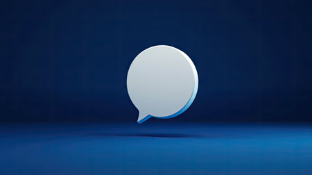 3D rendered white chat bubble on a rich blue background, ideal for illustrating conversation, text messaging, or dialogue in digital mediaの素材