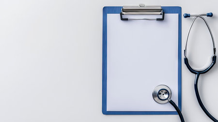 A detailed top view of a stethoscope lying near a clipboard featuring blank paper, emphasizing the essentials of medical practice against a clean white backdrop.の素材