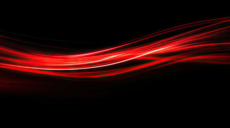 Abstract vector design featuring red light trails and rapid curves in motion, contrasted against a black backdrop for a sleek look.の素材