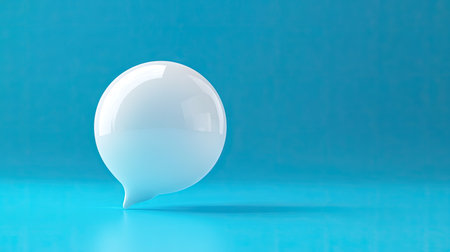 Abstract 3D white chat bubble on a vivid blue backdrop, perfect for illustrating communication, online chat, or message exchange.の素材