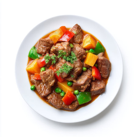 A vibrant beef stir-fry featuring colorful peppers and peas, beautifully garnished with fresh herbs. Perfect for a nutritious and delicious meal option.の素材