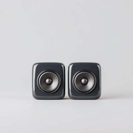 This image features a pair of modern square speakers designed for an enhanced audio experience, perfect for home or office setups. The sleek gray finish adds a touch of contemporary elegance, suitable for any interior.の素材