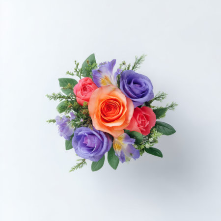 A stunning floral arrangement features vibrant roses and delicate flowers arranged artfully. Perfect for weddings, celebrations, or home decoration.の素材