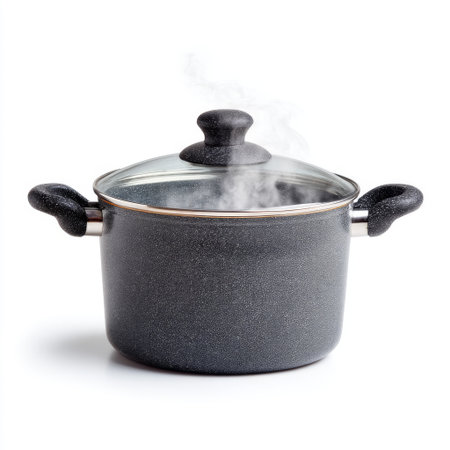 A sleek black non-stick cooking pot with a transparent lid releases steam, ideal for cooking delicious meals. Perfect for modern kitchens and culinary adventures.の素材