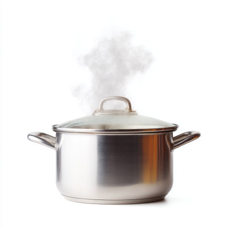 A stainless steel pot with a lid sits on a kitchen counter, releasing steam. Perfect for showcasing cooking concepts and meal preparation scenes.の素材