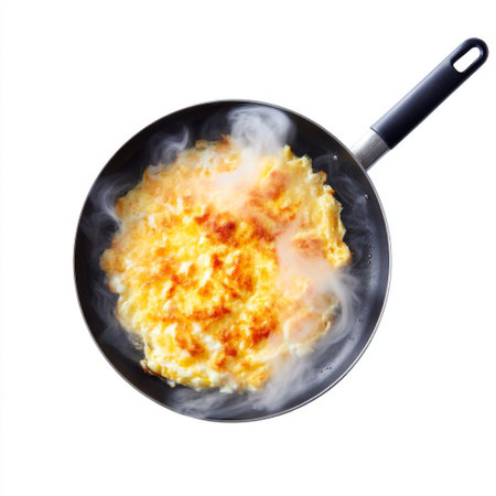 A vibrant image showcasing a beautifully baked cheese dish, emitting steam from a non-stick pan, highlighting the delicious golden texture and aroma.の素材