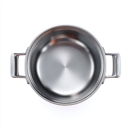 A shiny and sleek stainless steel cooking pot with two side handles sits on a clean white background, perfect for culinary illustrations and kitchenware features.の素材