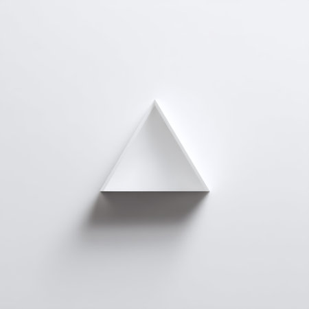 A stunning white triangle shape is featured on a minimalist background, showcasing soft shadows and natural light that enhances the geometric beauty and simplicity.の素材