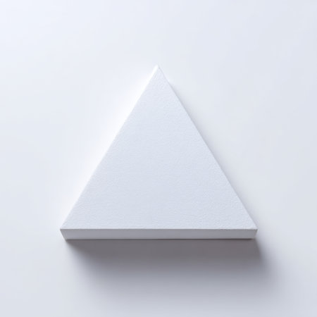 This image features a white triangle shape positioned on a minimalist background, showcasing modern design elements and a clean aesthetic. Perfect for artistic projects.の素材