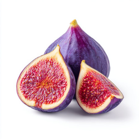 A fresh and ripe whole fig alongside a sliced half, showcasing its sweet and juicy interior. Perfect for healthy eating or culinary uses.の素材