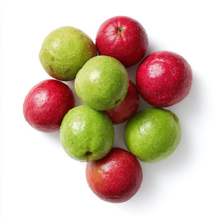 Discover a vibrant display of fresh red and green apples on a clean white background. These juicy fruits are perfect for healthy snacks, desserts, and recipes.の素材