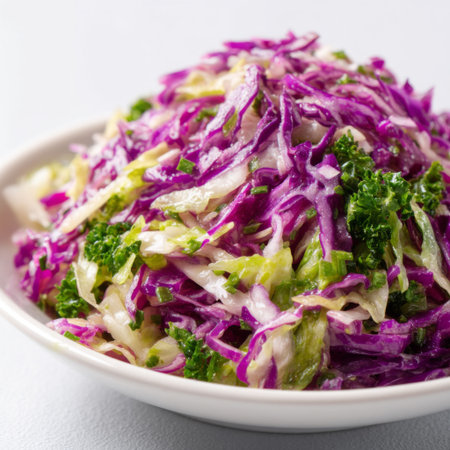 This vivid and healthy cabbage salad features an array of colors, combining purple cabbage, green veggies, and crisp textures. Perfect for enhancing any meal.の素材
