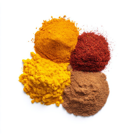 A beautiful assortment of spice powders showcasing vibrant colors, perfect for culinary projects, food photography, and enhancing flavors in dishes.の素材
