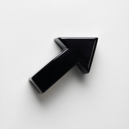 This image features a glossy black arrow icon placed on a clean white background, symbolizing direction and movement in modern design. Perfect for digital concepts.の素材