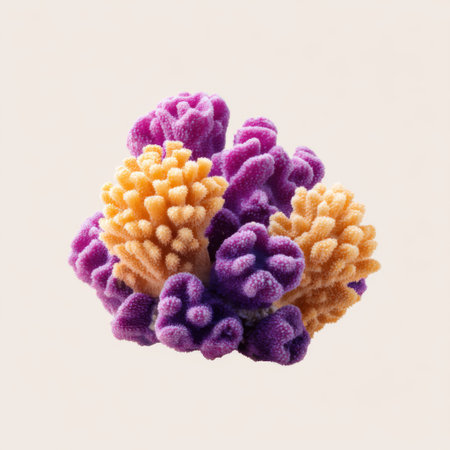 A striking close-up of a vibrant cluster of coral showcasing intricate shapes and vivid purple and orange colors against a light background.の素材