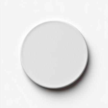 This image features a minimalistic white circular plate set against a clean background, ideal for showcasing food, utensils, or culinary art in a stylish manner.の素材