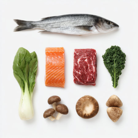 A visually appealing arrangement of fresh fish, salmon fillets, beef slices, leafy greens, and mushrooms showcases vibrant colors and healthy ingredients for culinary inspiration and recipe ideas.の素材
