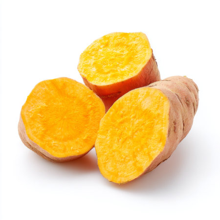 Fresh organic sweet potato showcasing vibrant orange flesh, perfect for health-conscious cooking. Ideal for various recipes and nutritious diets.の素材