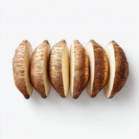 A visually appealing arrangement of sliced root vegetables presenting a clean and minimalist design. Ideal for culinary projects, cookbooks, or health-oriented themes.の素材