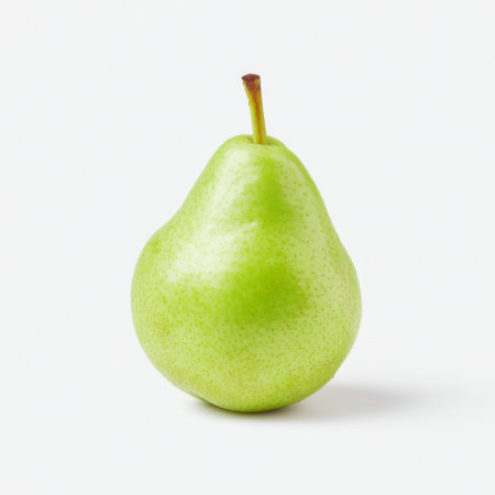 This image features a single green pear on a clean white background, showcasing its vibrant color and fresh appearance, ideal for food-related themes.の素材
