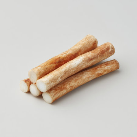 This image features fresh root sticks arranged on a light background, perfect for culinary inspiration and highlighting natural ingredients. Ideal for food blogs and recipe websites.の素材