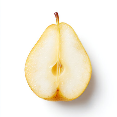 A beautifully halved fresh pear showcasing its smooth skin and juicy interior. This image highlights the fruit's natural beauty, perfect for nutrition and culinary themes.の素材