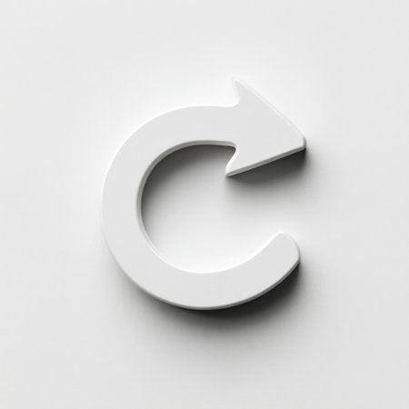 A clean and modern circular white arrow icon representing refresh or reload action, set against a light gray background. Perfect for digital applications.の素材