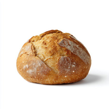 A beautifully baked round bread loaf showcasing a crisp golden crust and soft interior. Ideal for culinary projects, recipes, and food presentations.の素材