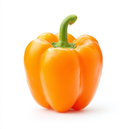 This image features a vibrant yellow bell pepper isolated against a white background. Ideal for projects related to cooking, nutrition, and healthy eating.の素材