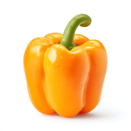 This image features a vibrant yellow pepper, showcasing its smooth texture and glossy finish. Ideal for culinary presentations, recipes, and healthy eating themes.の素材