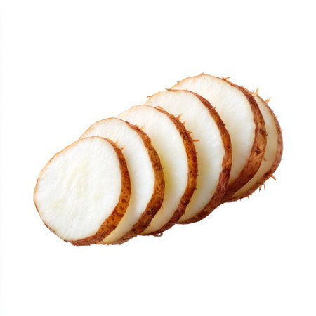 Freshly sliced yam displays its inviting brown skin and creamy white interior, perfect for showcasing nutrition, cooking versatility, and vibrant culinary uses.の素材