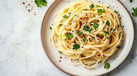 A beautifully arranged plate of spaghetti topped with herbs and spices, perfect for a delicious dining experience. Ideal for food photography and culinary inspiration.の素材
