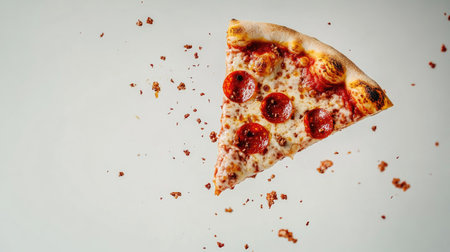 A creative shot of a falling pepperoni pizza slice, showcasing melted cheese, crispy crust, and vibrant toppings, perfect for food lovers and culinary enthusiasts.の素材