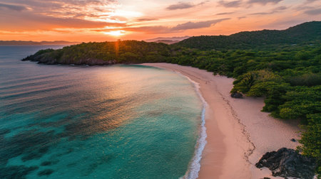 A peaceful, secluded beach with clear turquoise waters, fine white sand, and a warm, charming sunset sky.の素材