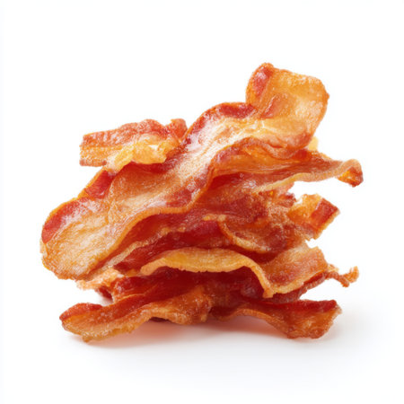 This image showcases a stack of crispy bacon strips, perfectly fried to a golden brown. Ideal for food-related projects, recipes, or menus, this appealing shot highlights the texture and deliciousness of bacon as a beloved culinary ingredient.の素材