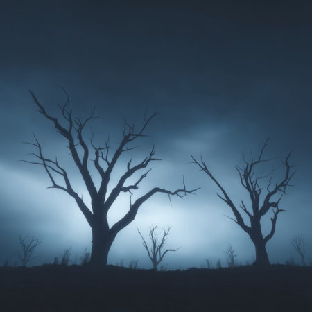 A haunting image of leafless trees standing tall against a dense fog, creating a serene yet mysterious atmosphere. Ideal for themes of solitude and nature.の素材