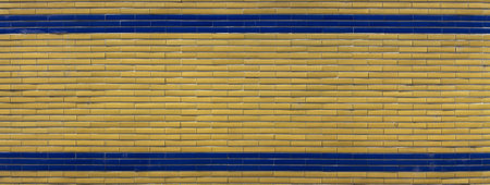 Blue and yellow brick wall texture. Abstract background and texture for design.