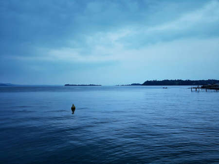 Tranquil scene of lake Garde, Italyの素材