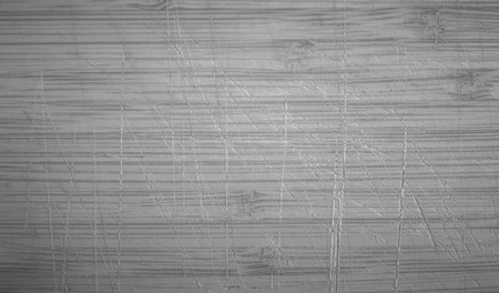 Scratched wooden background black and whiteの写真素材